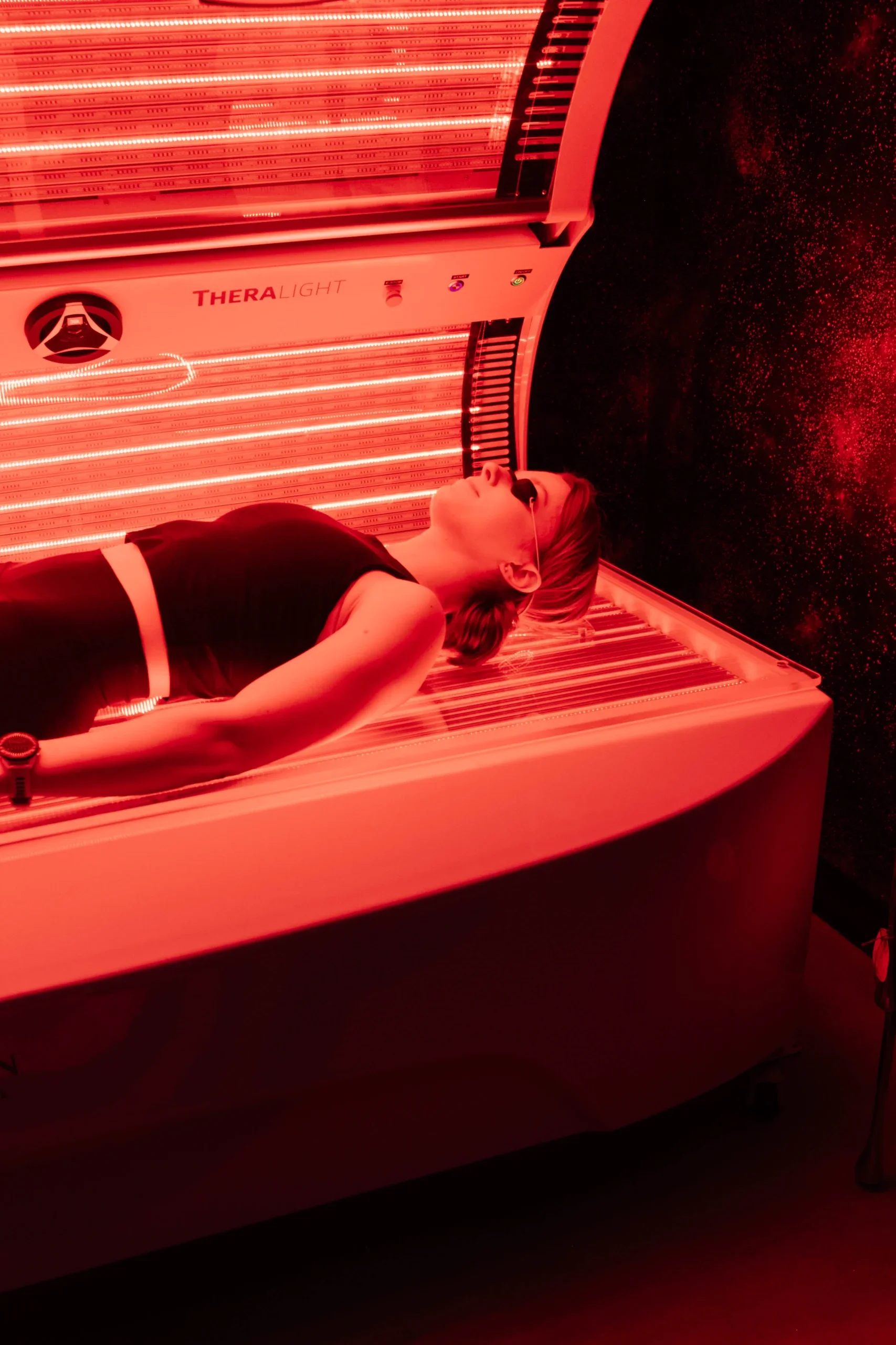Client receiving red light therapy in Denver wellness space